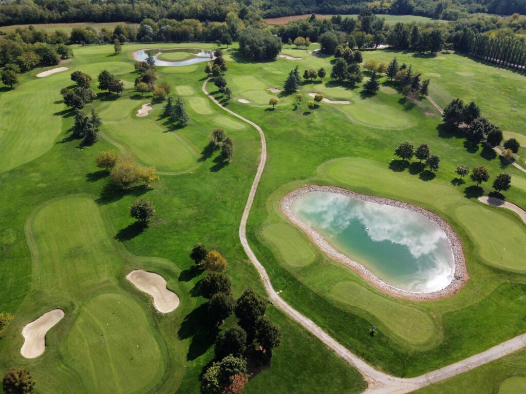 Luxury golf club field in sunlight