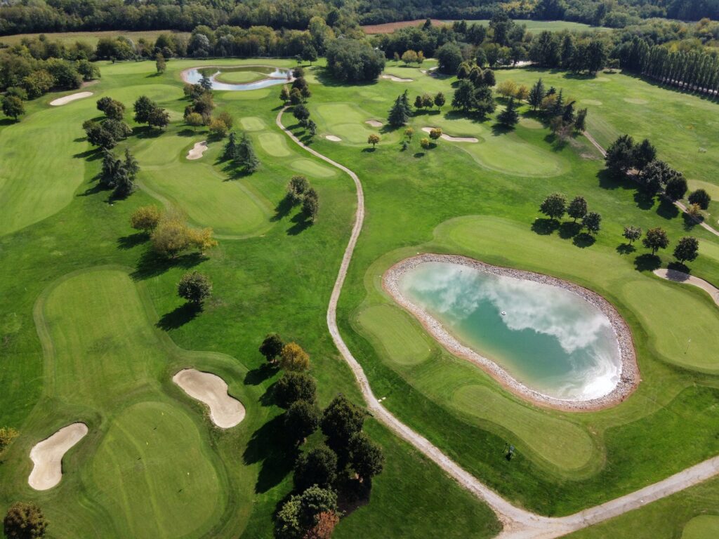 Luxury golf club field in sunlight