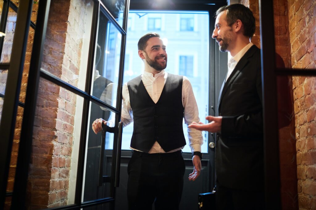 Two Business people Entering Restaurant